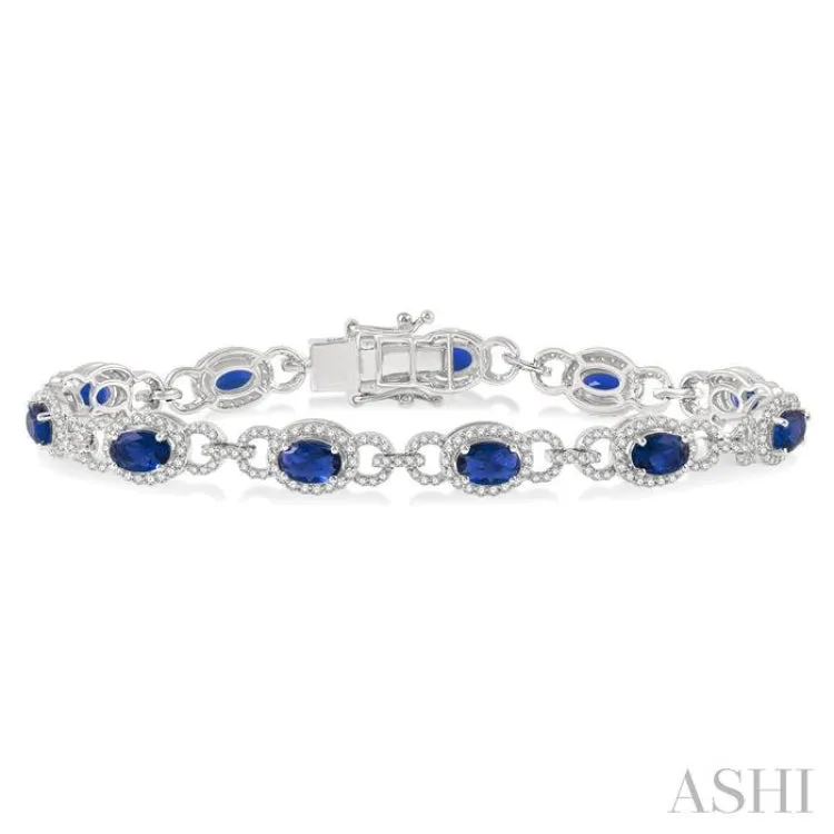 1 3/4 Ctw Round Cut Diamond & 6x4 MM Oval Cut Sapphire Precious Bracelet in 14K White Gold