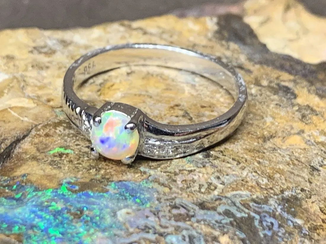 18kt White Gold Black Crystal Opal and Diamond ring