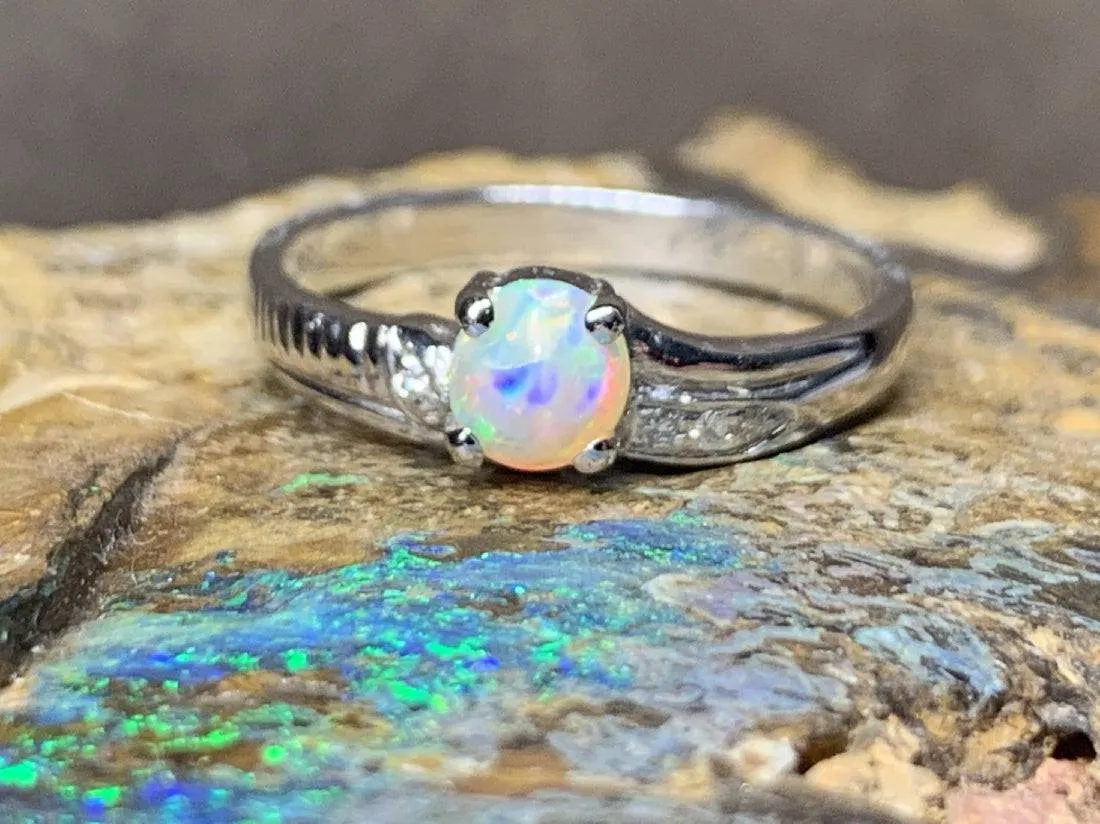 18kt White Gold Black Crystal Opal and Diamond ring