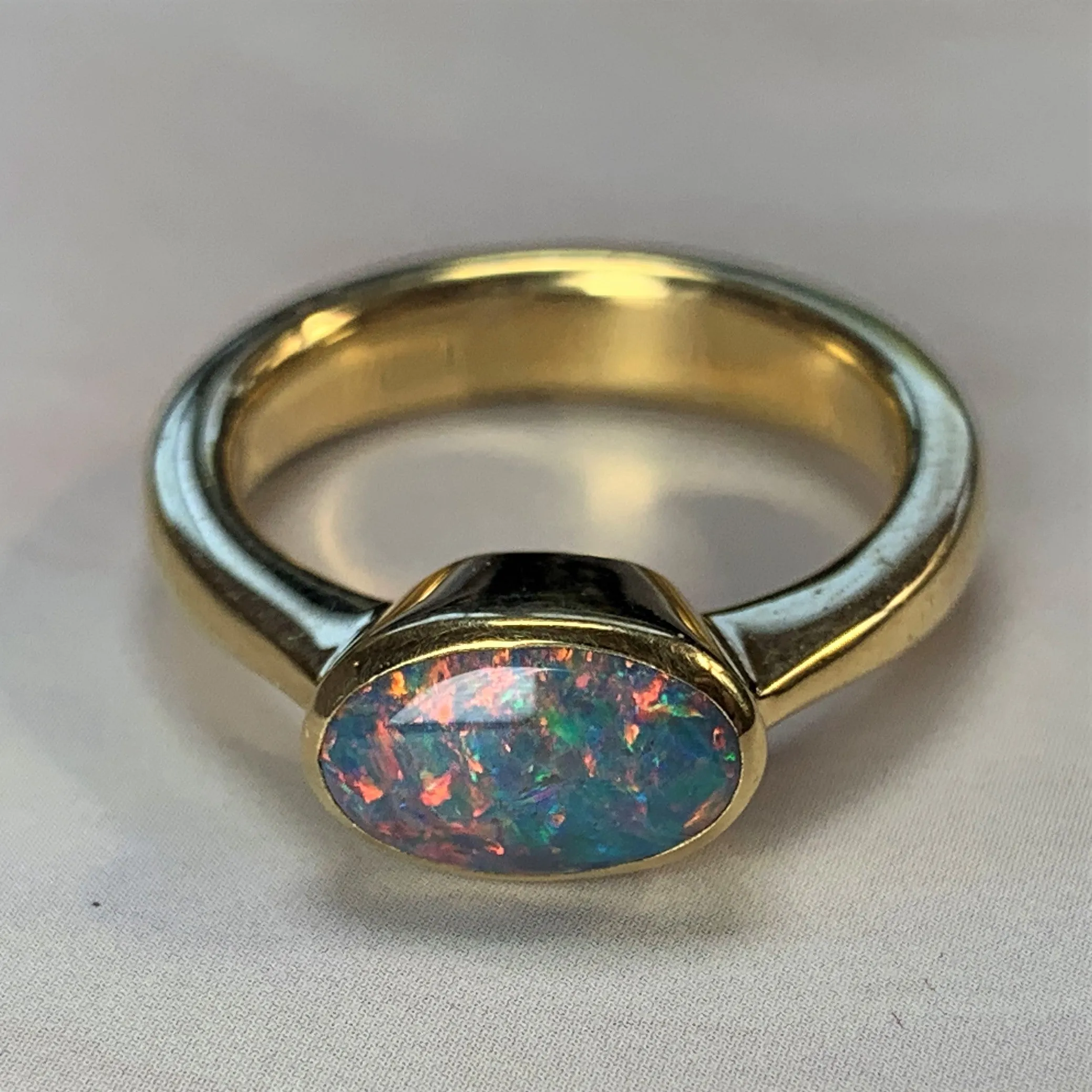 18kt Yellow Gold Black Opal 1.2ct bezel set