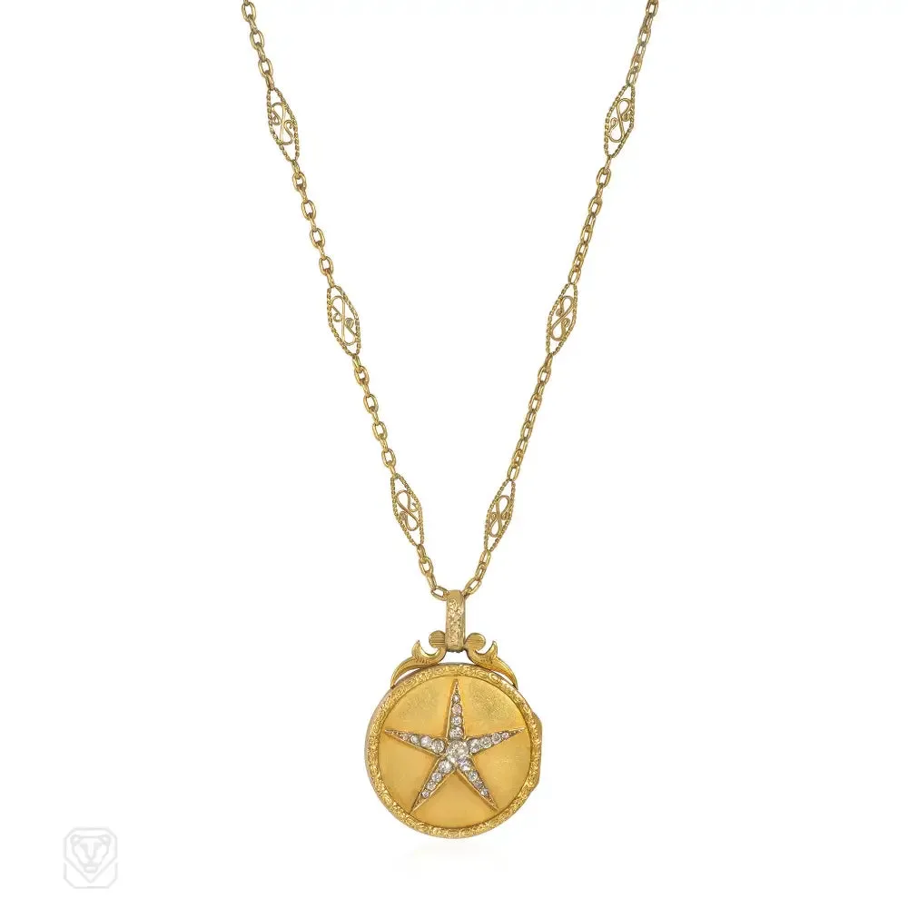 Antique gold and diamond star locket and chain