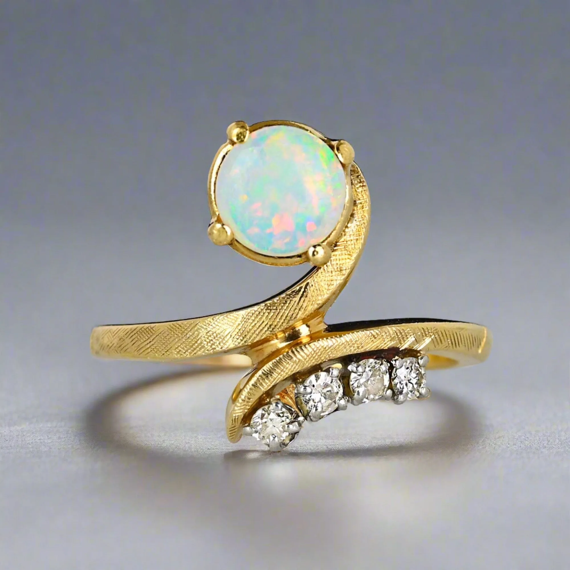 Vintage 14K Gold Bypass Diamond and Opal Ring