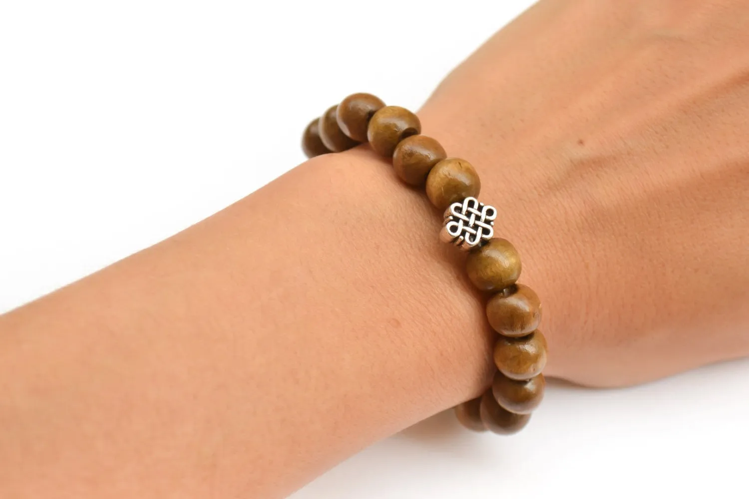 Wood beads stretch bracele with silver celtic endless knot charm